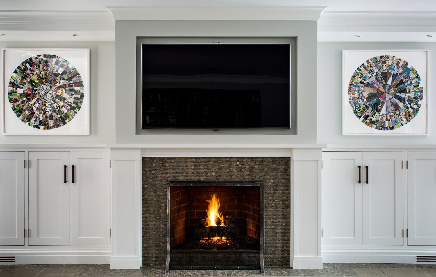 Elegant living room with fireplace and circular mosaic art.