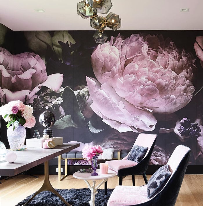 Stylish room with large floral wall mural and modern decor.