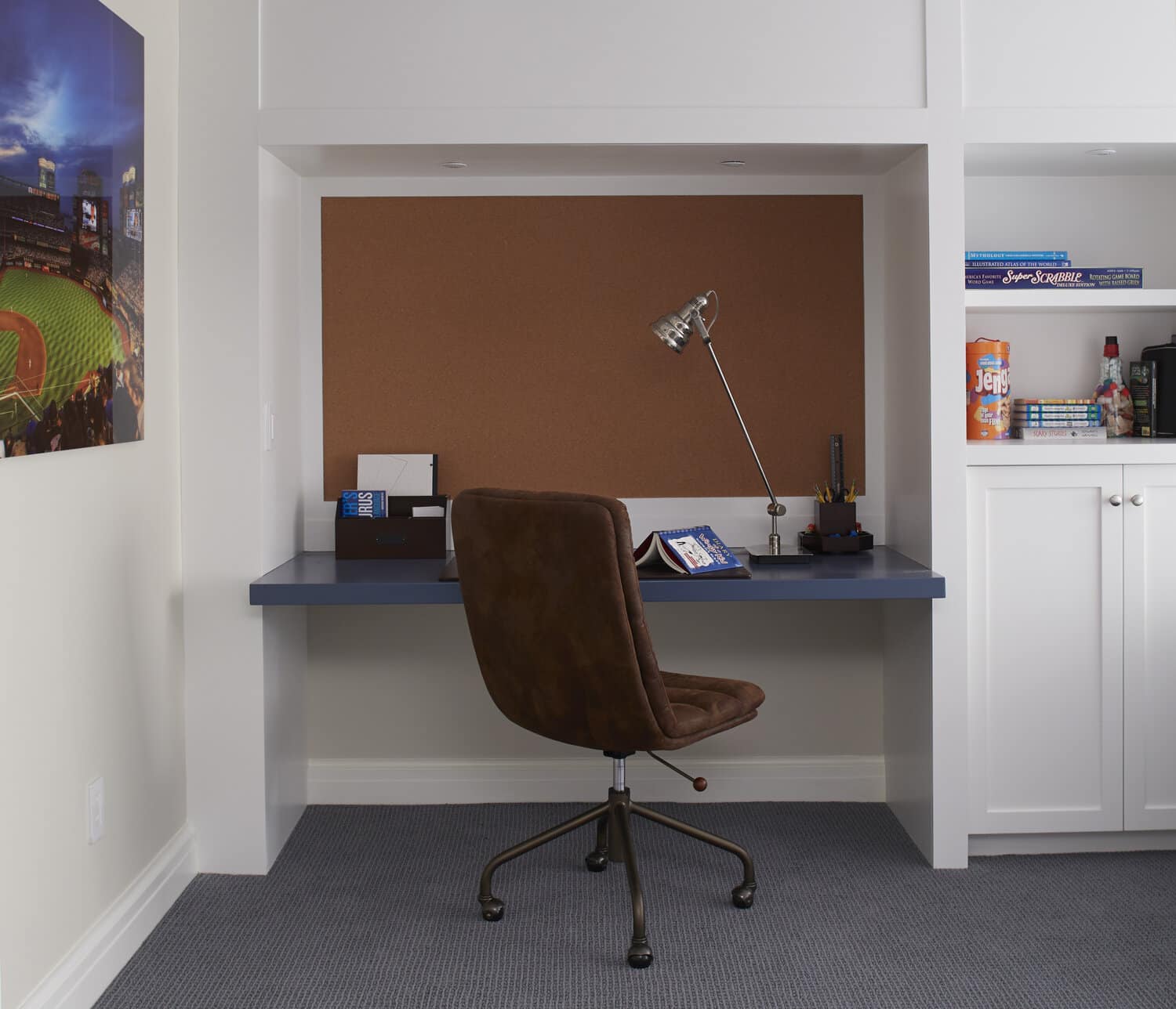 Modern home office nook with desk and chair.