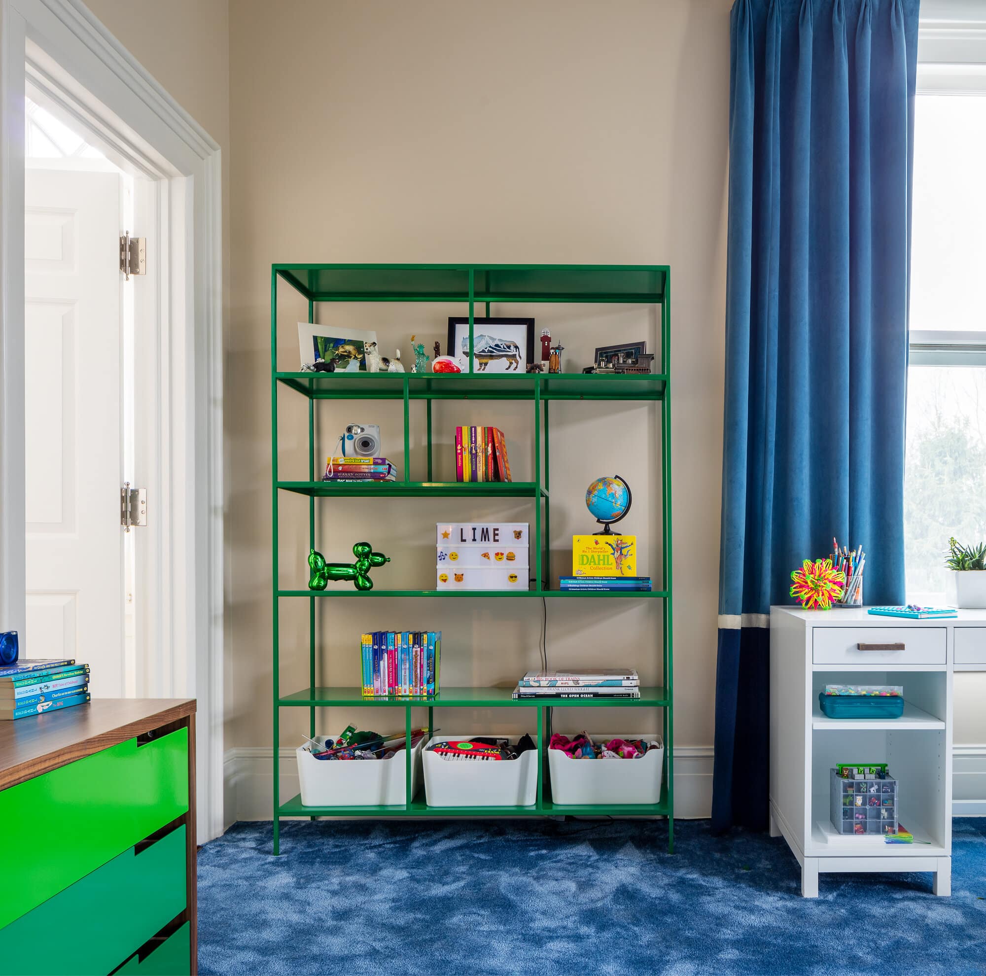 Bold color with lots of storage for this youth bedroom.