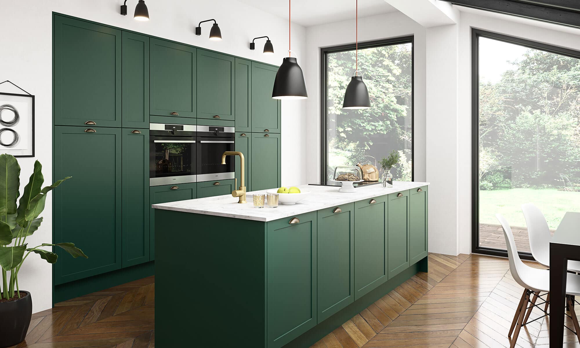 Modern kitchen with green cabinets and white countertops.