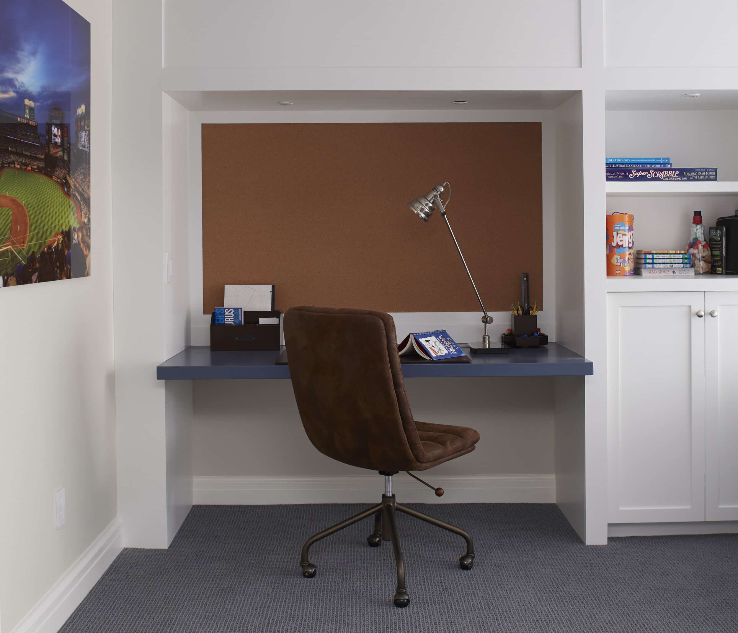 This former basement becomes a a multi-functional homework and hangout room.