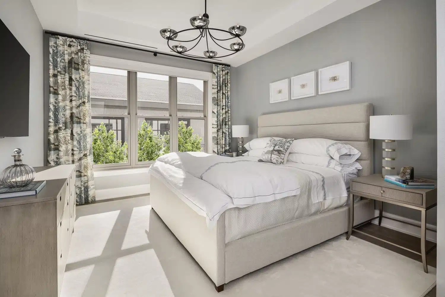 bedroom with gray walls and white linens